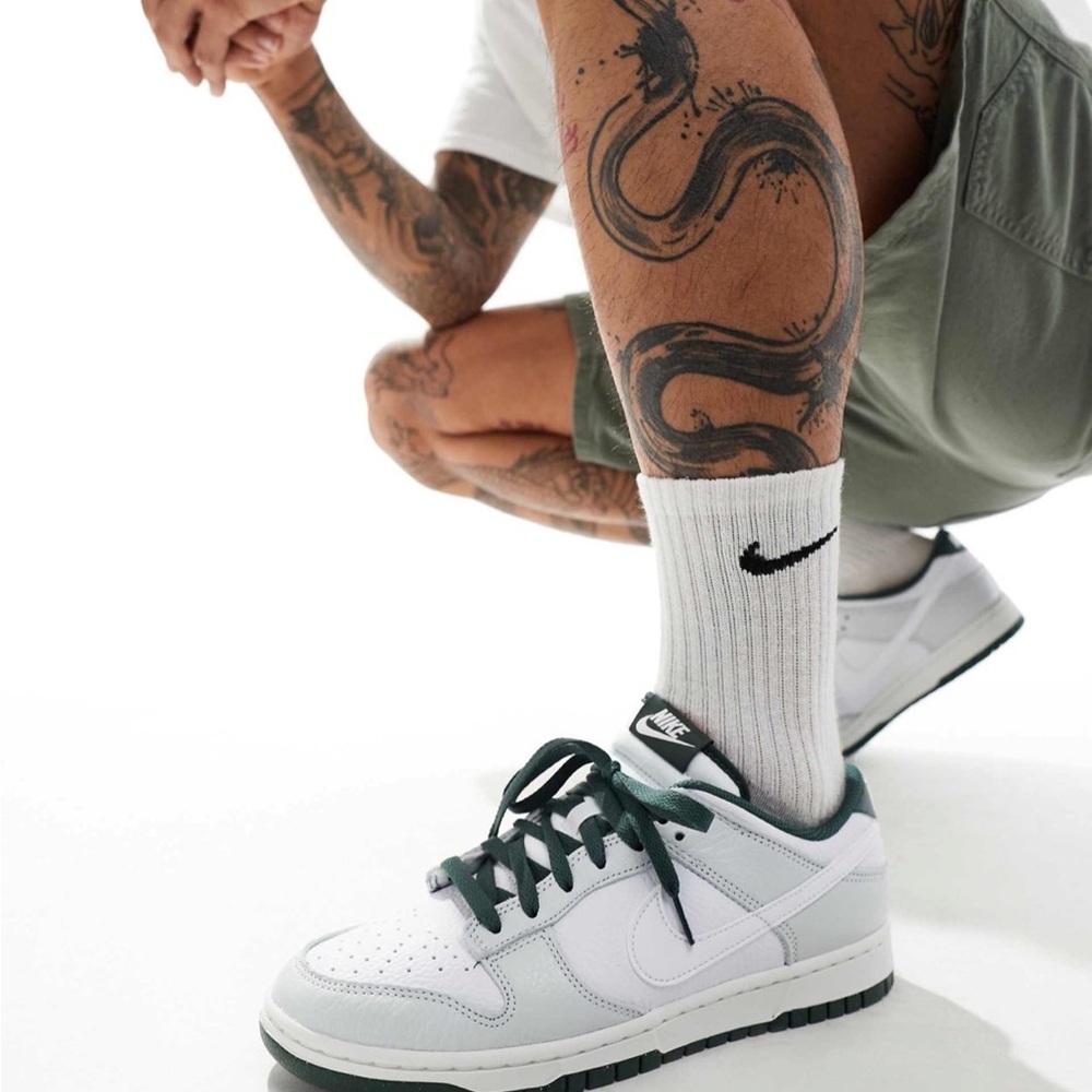 Nike Dunk Low Retro SE sneakers in white, gray and dark green